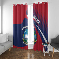 Red window curtain pair with Liberia coat of arms crest and ring-tab hanging