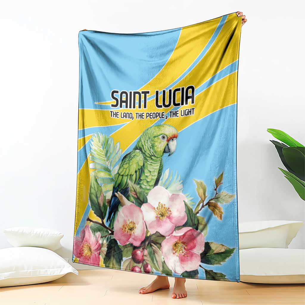 Blue blanket with yellow trim, parrot and pink blossoms graphic design