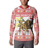 Red and white crewneck sweatshirt with lion graphic, starburst accents, holiday pattern, red trim
