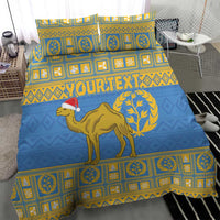 Blue and gold bedding set with camel and laurel print on duvet and two pillowcases