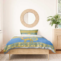 Blue and gold bedding set with camel and ornate border on duvet and pillow