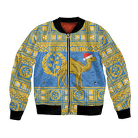 Blue bomber jacket with front zip, camel in santa hat, gold geometric Christmas print