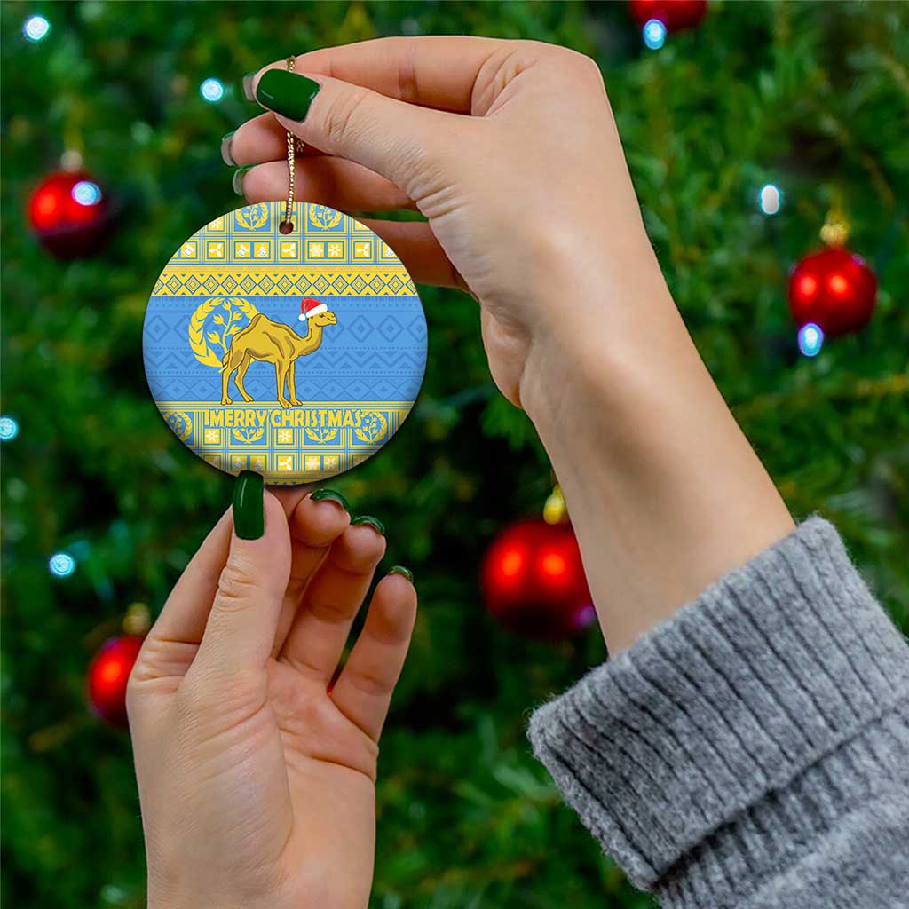 Blue circular Eritrea Christmas ceramic ornament with gold camel and “MERRY CHRISTMAS”
