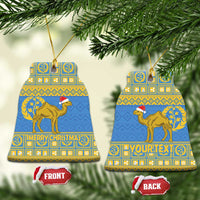 Blue bell-shaped Eritrea Christmas ceramic ornament with gold camel and “MERRY CHRISTMAS”