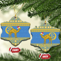 Blue heart-shaped Eritrea Christmas ceramic ornament with gold camel and “YOURTEXT”