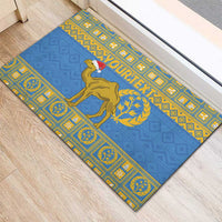 Blue rubber doormat with yellow patterned edges, camel emblem and centered laurel design