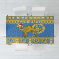 Blue tablecloth with yellow border and large national emblem camel design