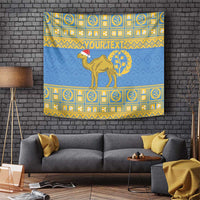 Blue tapestry with camel and gold emblem-style patterned border
