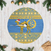 Blue circular Christmas tree skirt with Eritrea emblem, camel and fringe edge