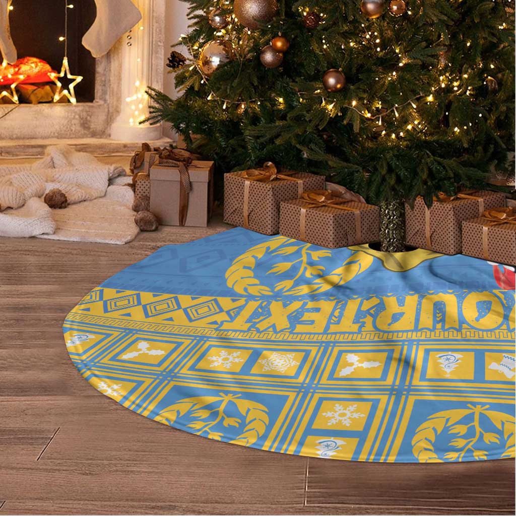 Blue Christmas tree skirt with gold pattern and central camel emblem