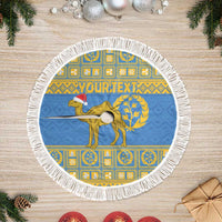 Blue round tree skirt with gold Eritrea design and white fringe border