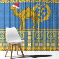Blue window curtain with large gold camel and circular tree emblem pattern