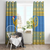 Pair of blue window curtains with gold camel and circular tree emblem, full length