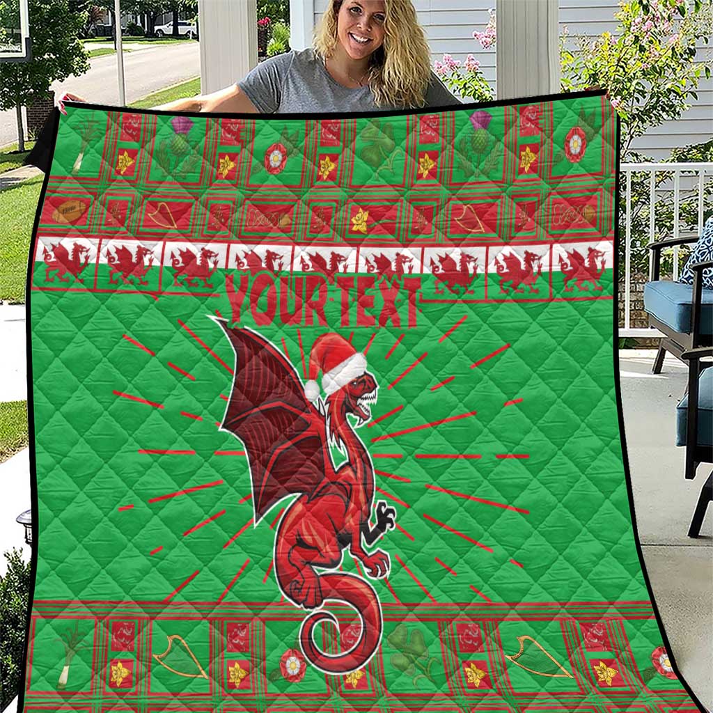 Green Christmas quilt with red patterned border and Welsh dragon graphic, personalized text