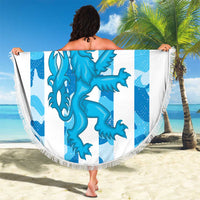 Round blue beach blanket with fringe edge, dragon graphic and 'YOUR TEXT' held up