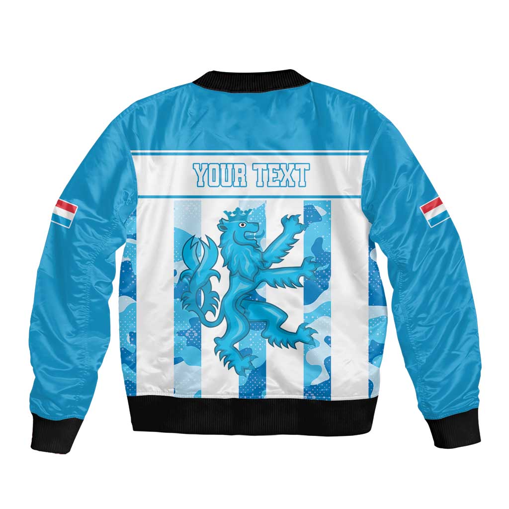 Blue bomber jacket back with 'YOUR TEXT' print, dragon graphic, black ribbed hem and cuffs