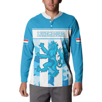 Blue button sweatshirt with "LUXEMBOURG" crest graphic and striped cuff bands