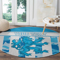 Round blue patterned rug with teal dragon artwork and 'YOUR TEXT' banner