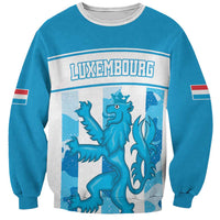 Blue crewneck sweatshirt with front graphic lion and striped sleeve accents