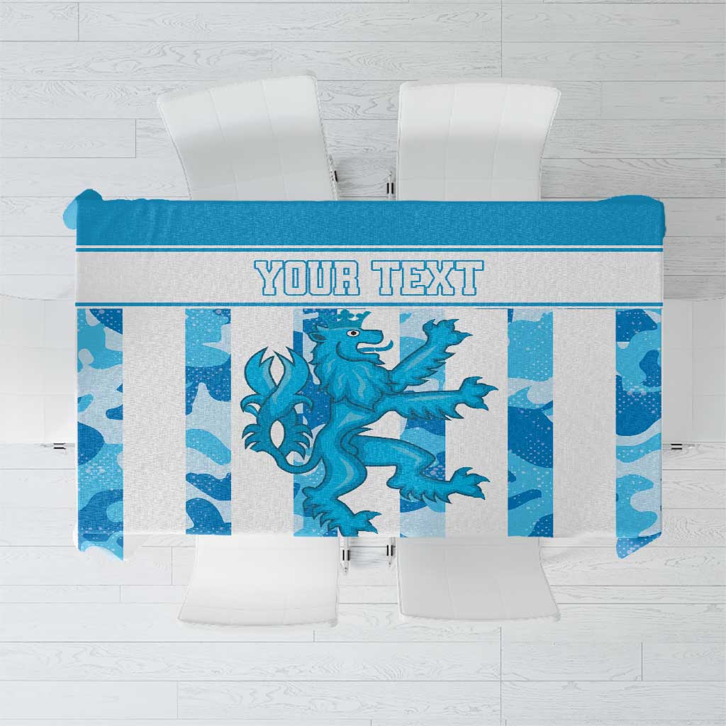 Blue personalized tablecloth with grunge lion graphic and 'YOUR TEXT' band