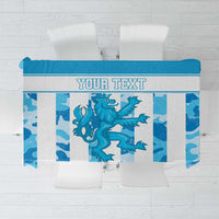 Blue personalized tablecloth with grunge lion graphic and 'YOUR TEXT' band