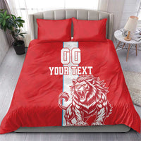 Red football bedding set with duvet and two pillows, lion mascot and 'YOUR TEXT' design