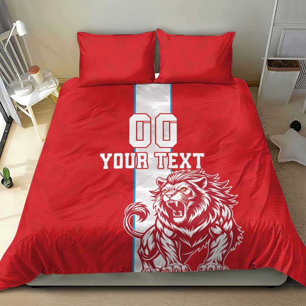 Red football bedding set with duvet and two pillows, lion graphic and 'YOUR TEXT' text panel