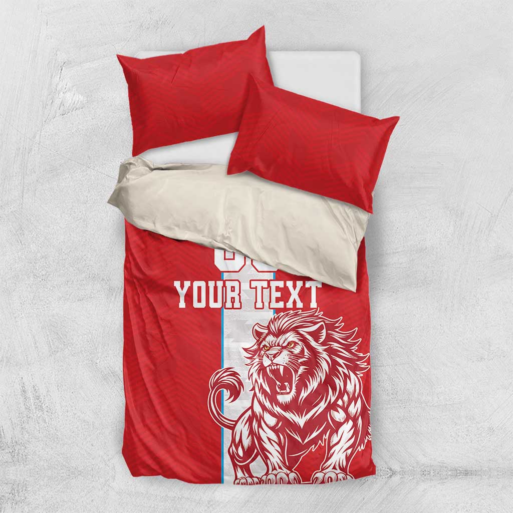 Red football bedding set with duvet and two pillows, lion mascot and 'YOUR TEXT' on white panel