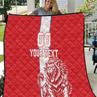 Red quilt with white stripe, lion graphic, number 00, and 'YOUR TEXT'