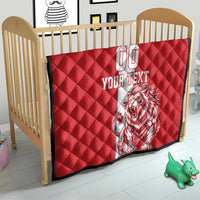 Red quilt on baby crib with white stripe, lion graphic, 'YOUR TEXT' and 00