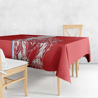 Red football tablecloth with white lion-style graphic panel and side drape