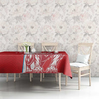 Red custom football tablecloth with white lion graphic panel on dining table