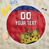 Red and blue Liechtenstein football beach blanket with white fringe edge and yellow crest