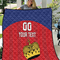 Custom football quilt, blue and red diamond pattern with crown logo, '00' and 'YOUR TEXT'.