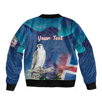 Blue bomber jacket with rear text, Iceland flag design and snowy bird