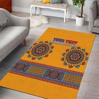 Yellow area rug with blue medallion pattern and personalized Haiti text
