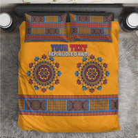 Yellow bedding set with blue medallion design and patterned border, includes two pillows