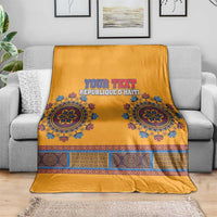 Yellow dashiki-style blanket with large circular blue pattern and 'YOUR TEXT' print