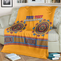 Yellow dashiki-style blanket with blue emblem band and 'YOUR TEXT' and Haiti text