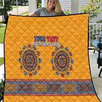 Yellow quilted blanket with blue “YOUR TEXT” and “Republique d’Haiti”, decorative border