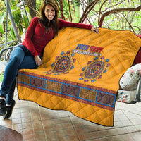 Yellow quilted blanket with blue “YOUR TEXT” and “Republique d’Haiti” medallions
