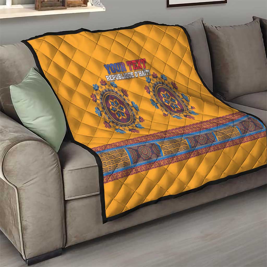 Yellow quilt on a sofa with blue medallions, quilted diamond pattern, dark edging