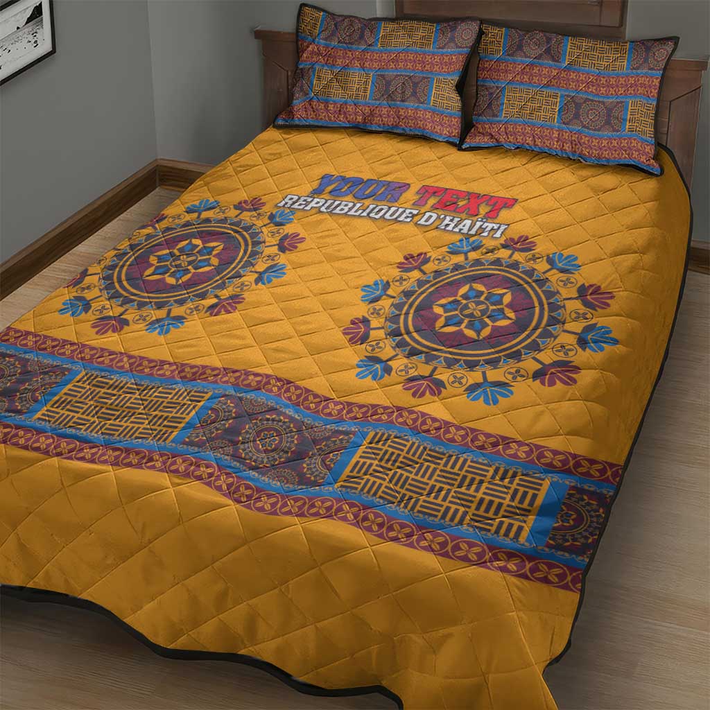 Yellow quilt bed set with blue medallion graphics, patterned border, and two pillows
