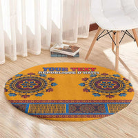 Round yellow dashiki-style carpet with blue circular medallions and patterned lower band