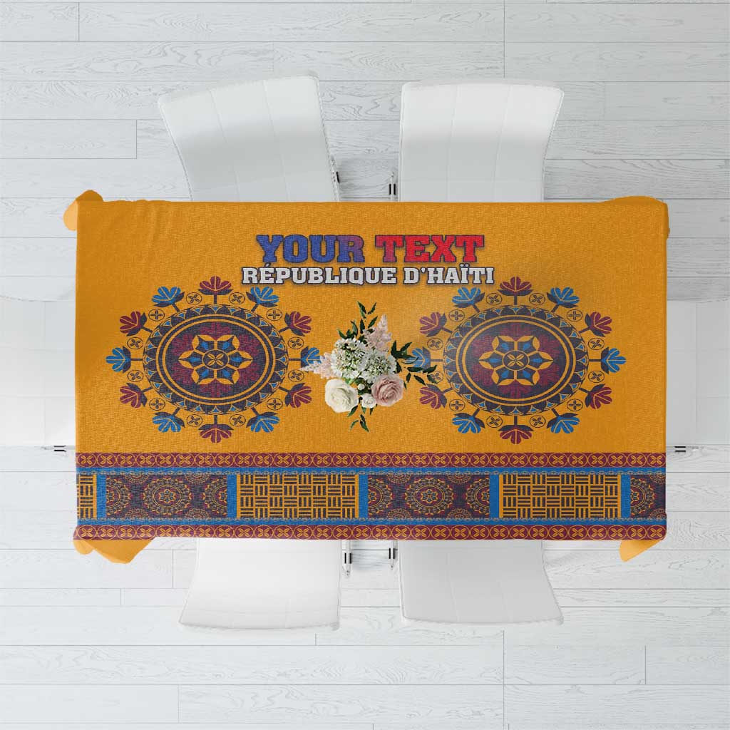 Yellow personalized Haiti dashiki tablecloth with blue patterned border and central emblem panel