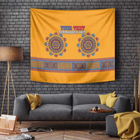 Yellow dashiki tapestry featuring blue medallions and a wide geometric border stripe