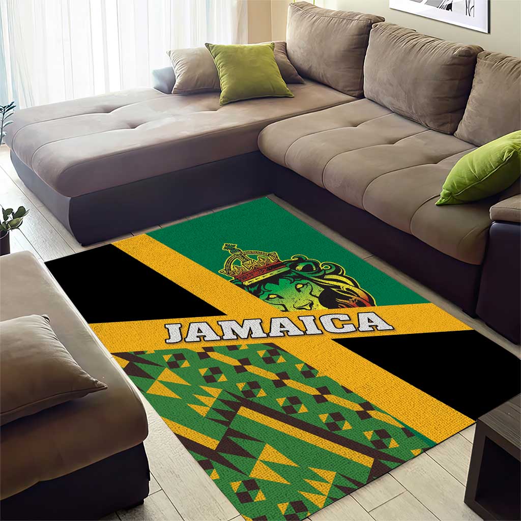 Green area rug with JAMAICA word, lion crest, and black yellow stripe with Kente border