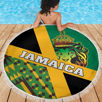 Round beach blanket showing green lion with crown, yellow/black stripes, and fringe edge