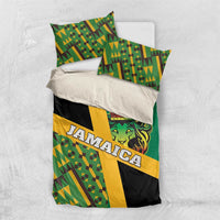 Green Jamaica bedding set with Kente pattern, lion crest and 'JAMAICA' text