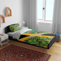 Green Jamaica bedding set with Kente pattern, lion crest panel on duvet